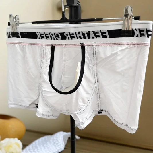 White sports boxer shorts with black pouch panel and wide logo elastic waistband
