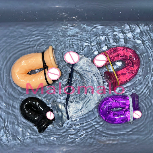 Set of transparent jelly sex toys with suction bases in flesh, black, purple, and magenta