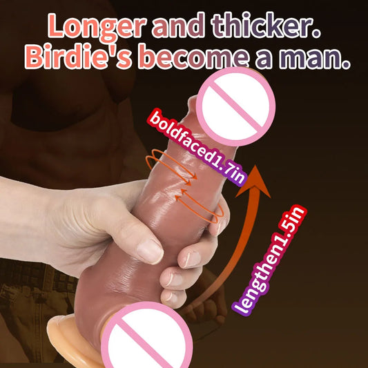 Penis extension sleeve with smooth, glossy pink finish; shown held by a hand.