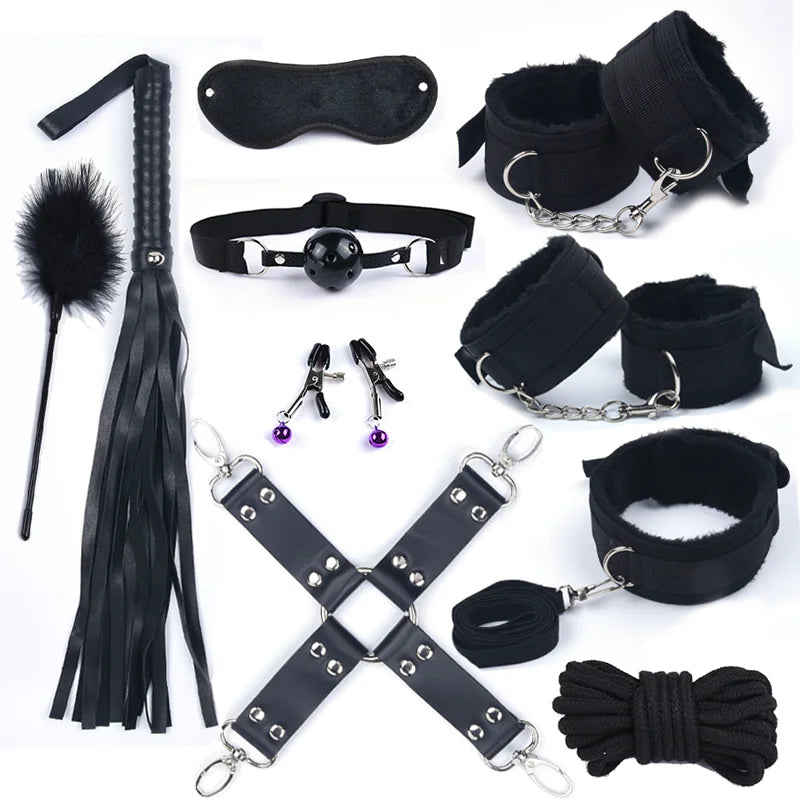 All-black bondage set: blindfold, collar with ball gag, ankle cuffs, flogger, paddle, plug