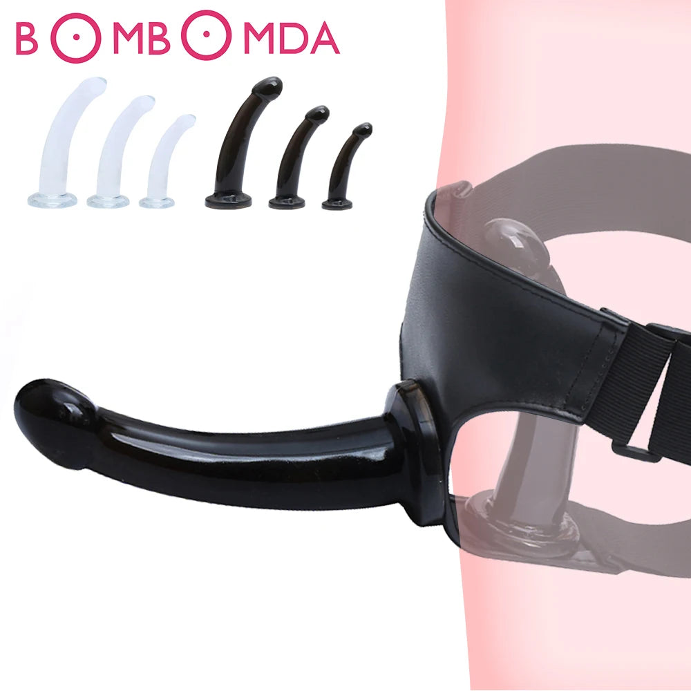 Strap-on harness with curved dildo and set of attachment dildos; black and clear