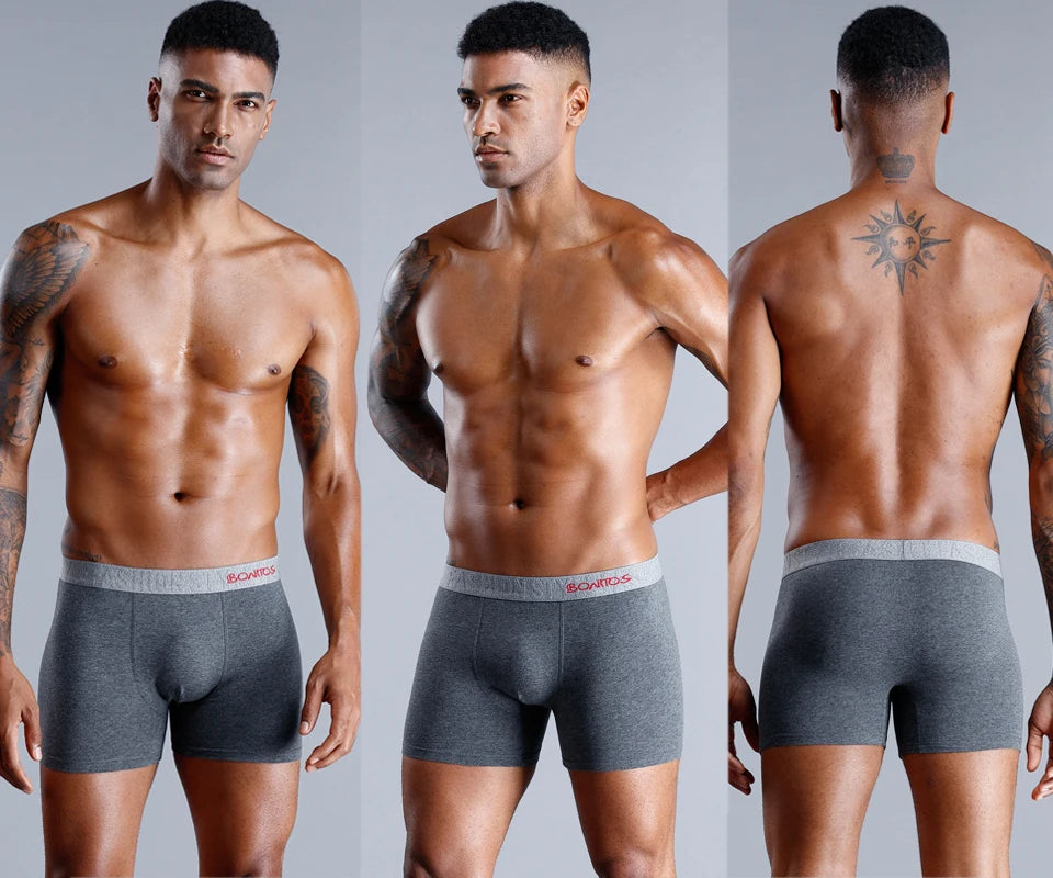 Men's gray long boxer briefs with elastic waistband and contoured front panel.