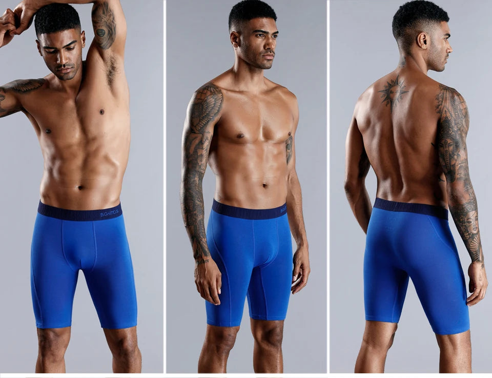 Men's blue long boxer briefs, front and side views with elastic logo waistband.