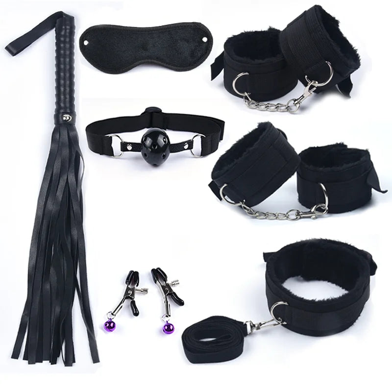 Black bondage accessory set: blindfold, collar, cuffs, ankle restraints, flogger, paddle