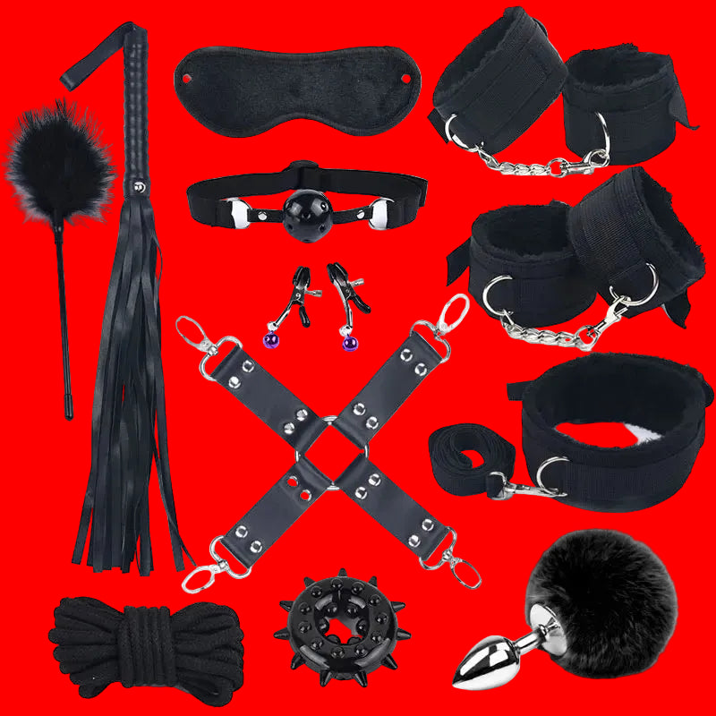 Black bondage set with accessories on red background: blindfold, collar, cuffs, flogger, plug