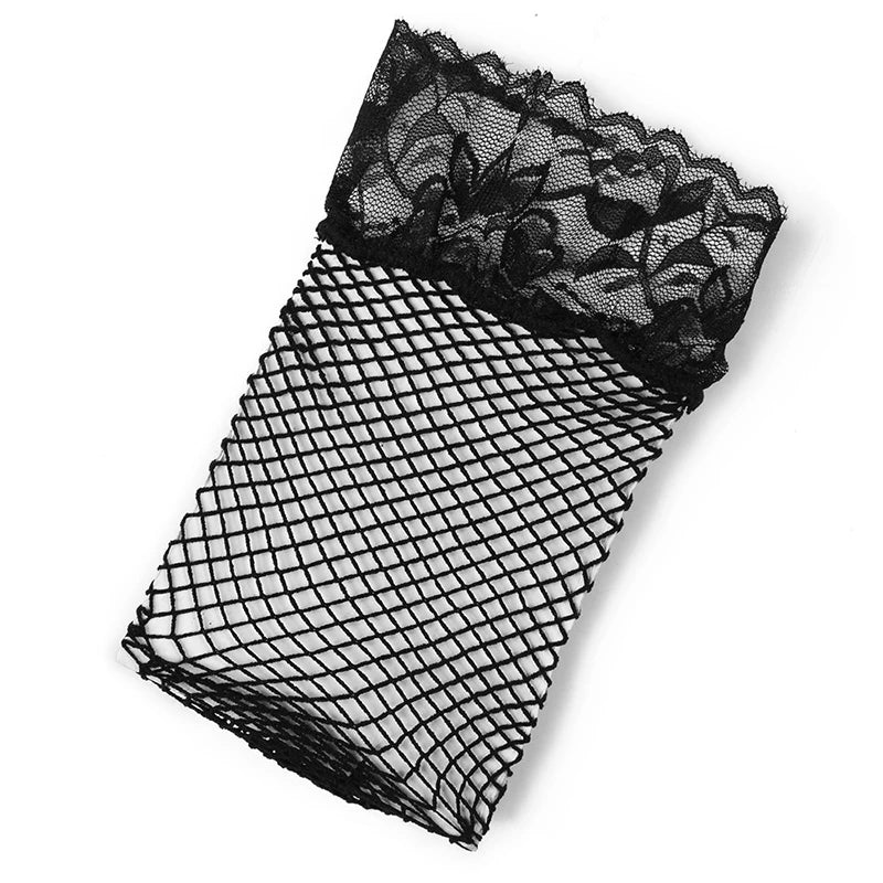 Black lace garter top with fishnet stockings and matching panty