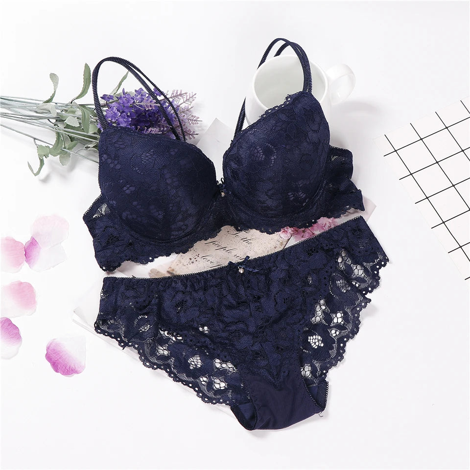 Navy blue lace underwired push-up bra and matching briefs set