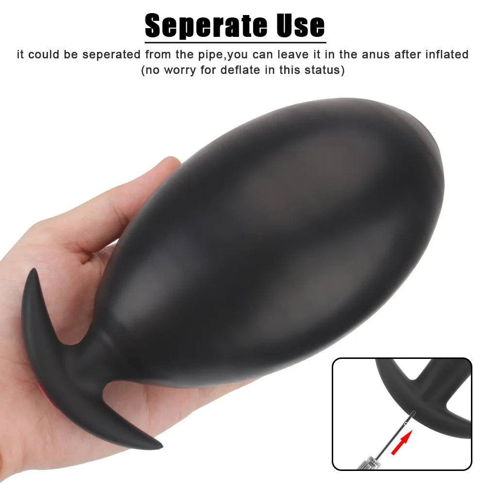 Black inflatable anal plug with separate tube connector near the base