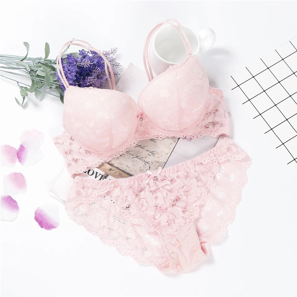 Light pink lace underwired push-up bra and matching briefs set