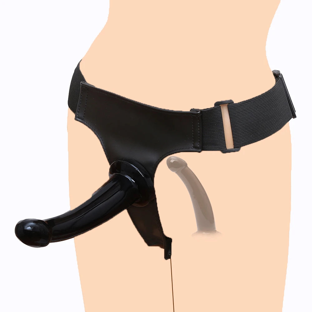 Black strap-on harness worn on model with curved dildo and leg strap