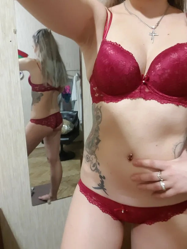 Burgundy lace underwired push-up bra and matching briefs worn on model