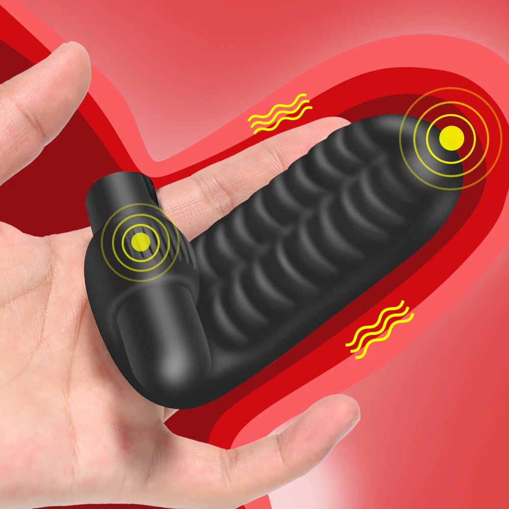 Black textured finger sleeve vibrator held in hand with circular control marks