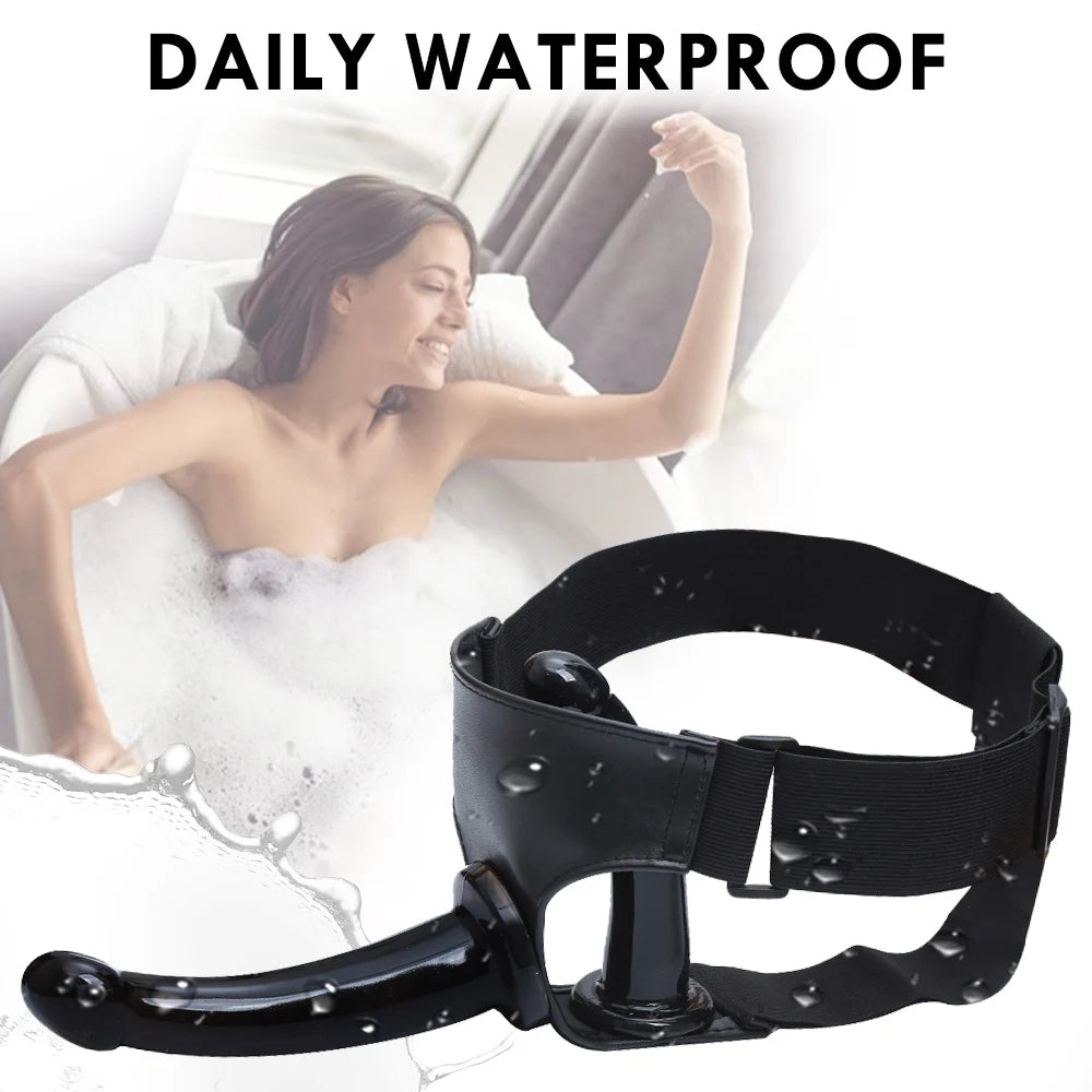 Black strap-on harness with curved dildo; splash-proof use shown