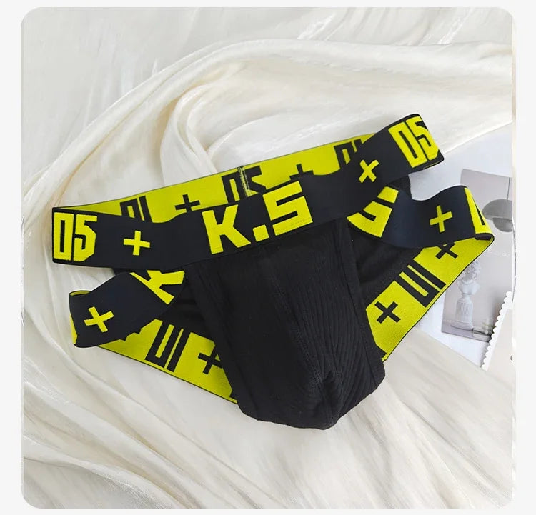 Black ribbed stretch brief with wide elastic waistband and yellow logo print.