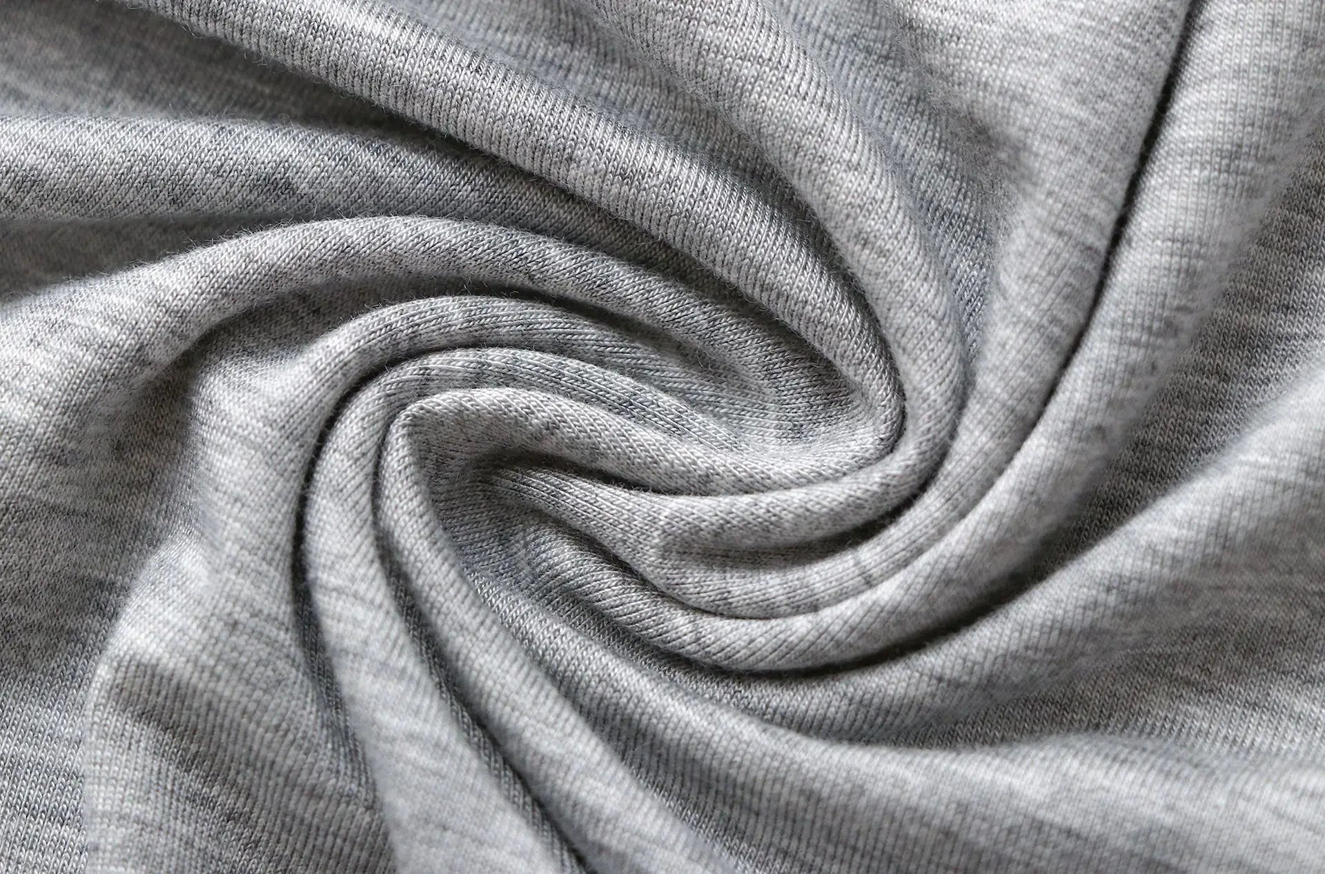 Gray jersey fabric close-up with soft folds