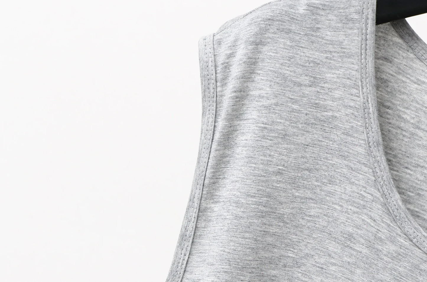 Gray sleeveless sleepwear vest dress side panel seam close-up