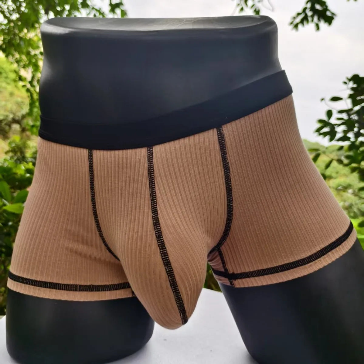Khaki ribbed boxer shorts with wide black waistband and contrast trim, large front pouch