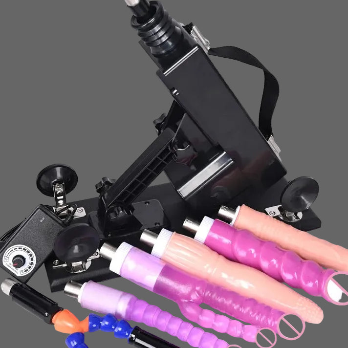 Automatic thrusting sex machine with light pink and magenta dildos and black frame