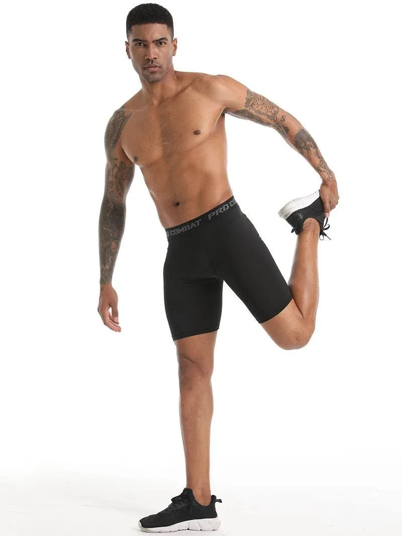 Black quick-dry sports boxer shorts worn in standing pose, PRD Combat logo waistband visible