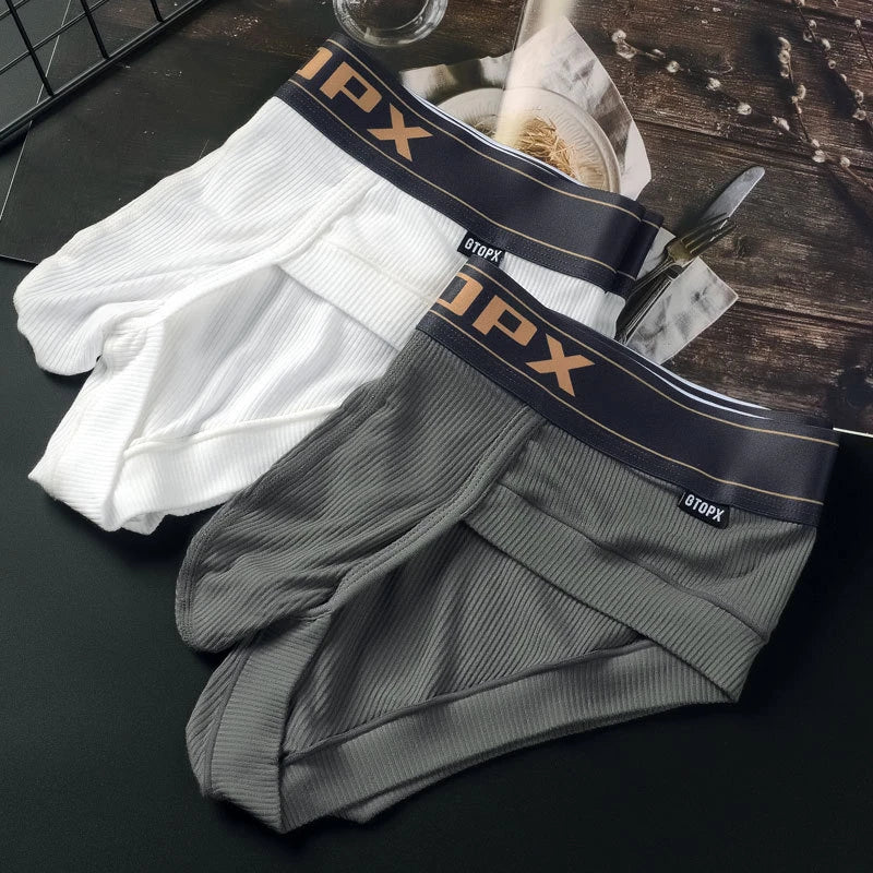White and gray modal wicking U-pouch boxer briefs laid flat, ribbed texture
