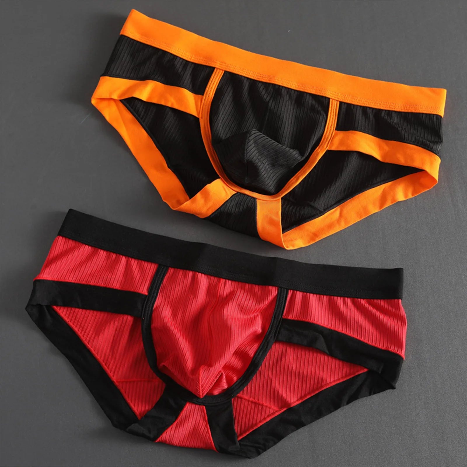 Striped U-pouch low-rise brief in orange with black waistband and side panels