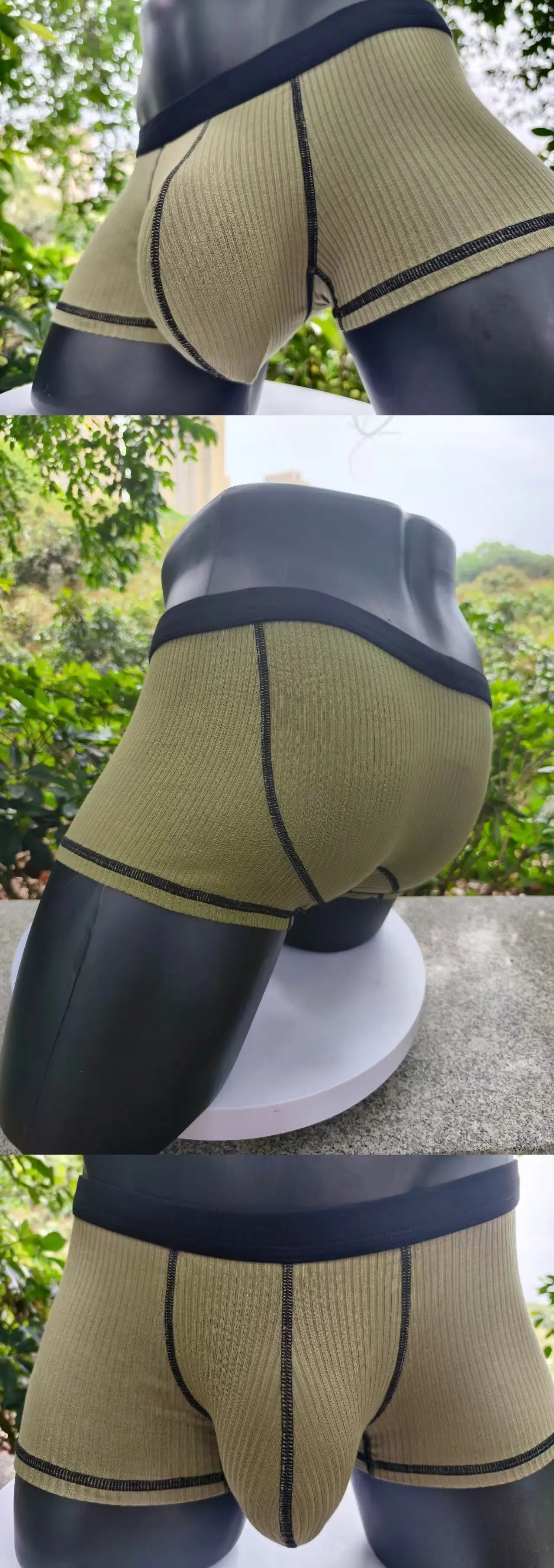 Khaki/olive ribbed boxer shorts with black waistband and contrast seam piping.