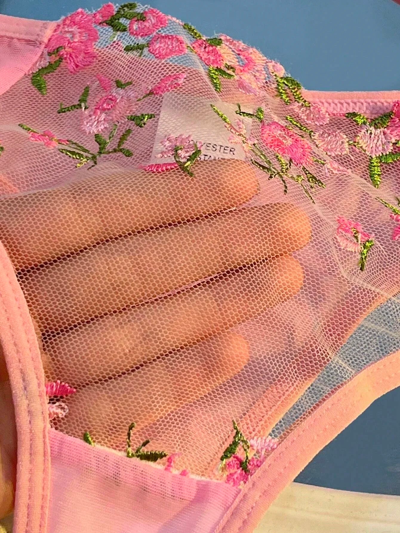 Pink sheer mesh bra cup with floral embroidery and scalloped lace trim