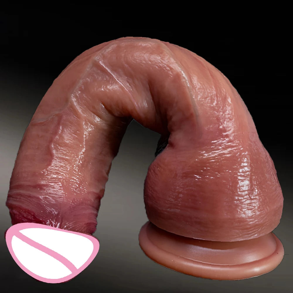 Flesh-toned realistic sex toy with arched shape and suction base