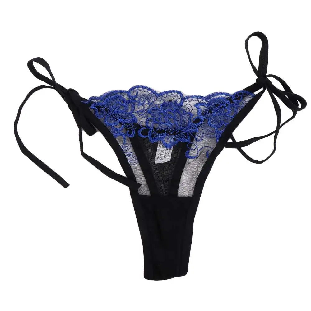 Embroidered lace panty brief in blue lace over black with sheer side panels and ties