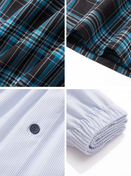 Plaid woven boxer shorts fabric close-up with blue and teal plaid stripes