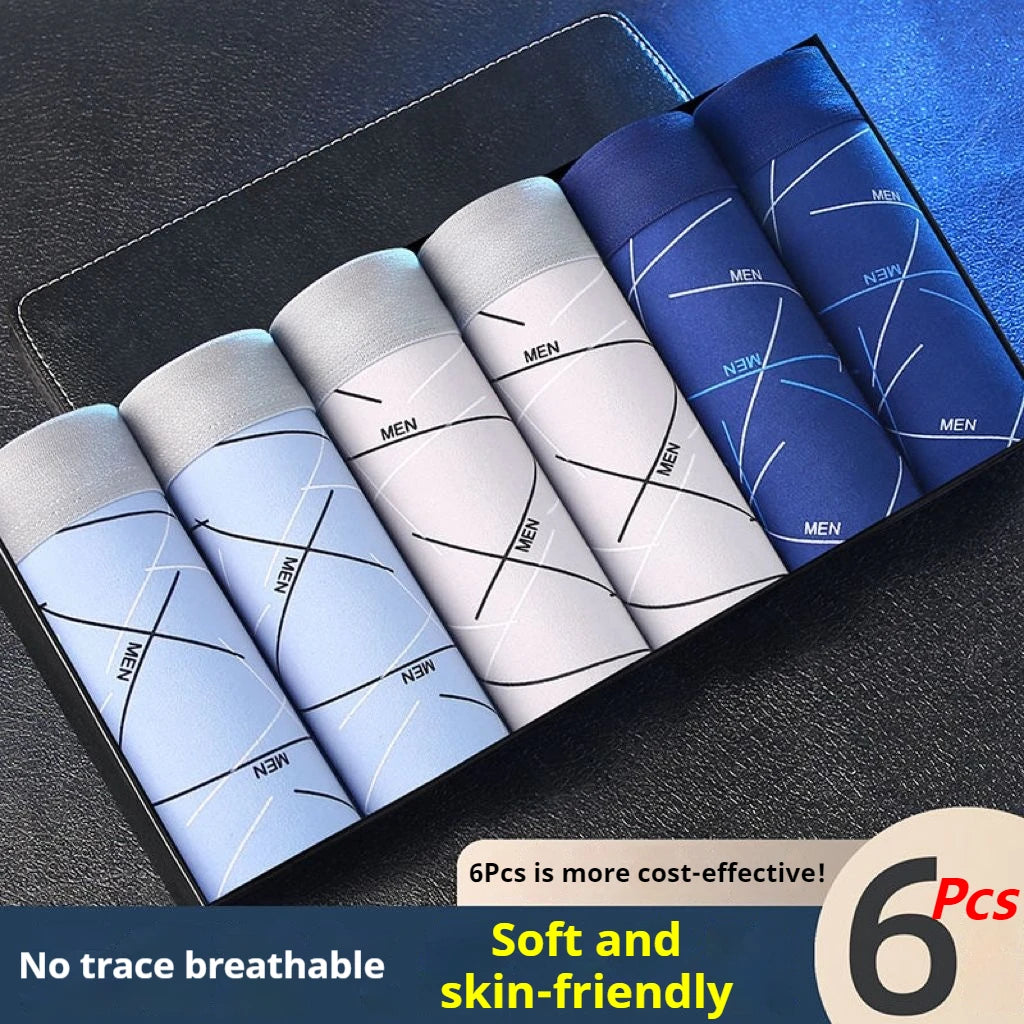 6-pack men’s stretch trunk shorts, assorted grays and blues folded in a tray