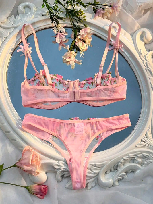 Pink lace bra and thong set with floral embroidery, bow-tied straps