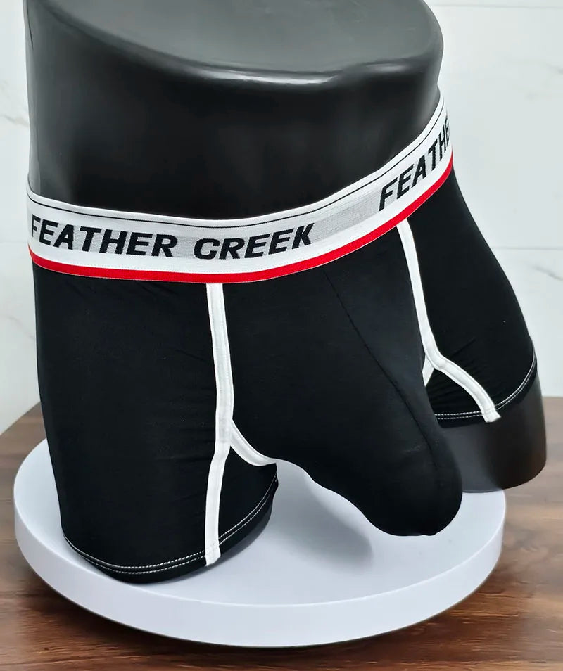 Black sports boxer shorts with white contrast seams and elastic logo waistband