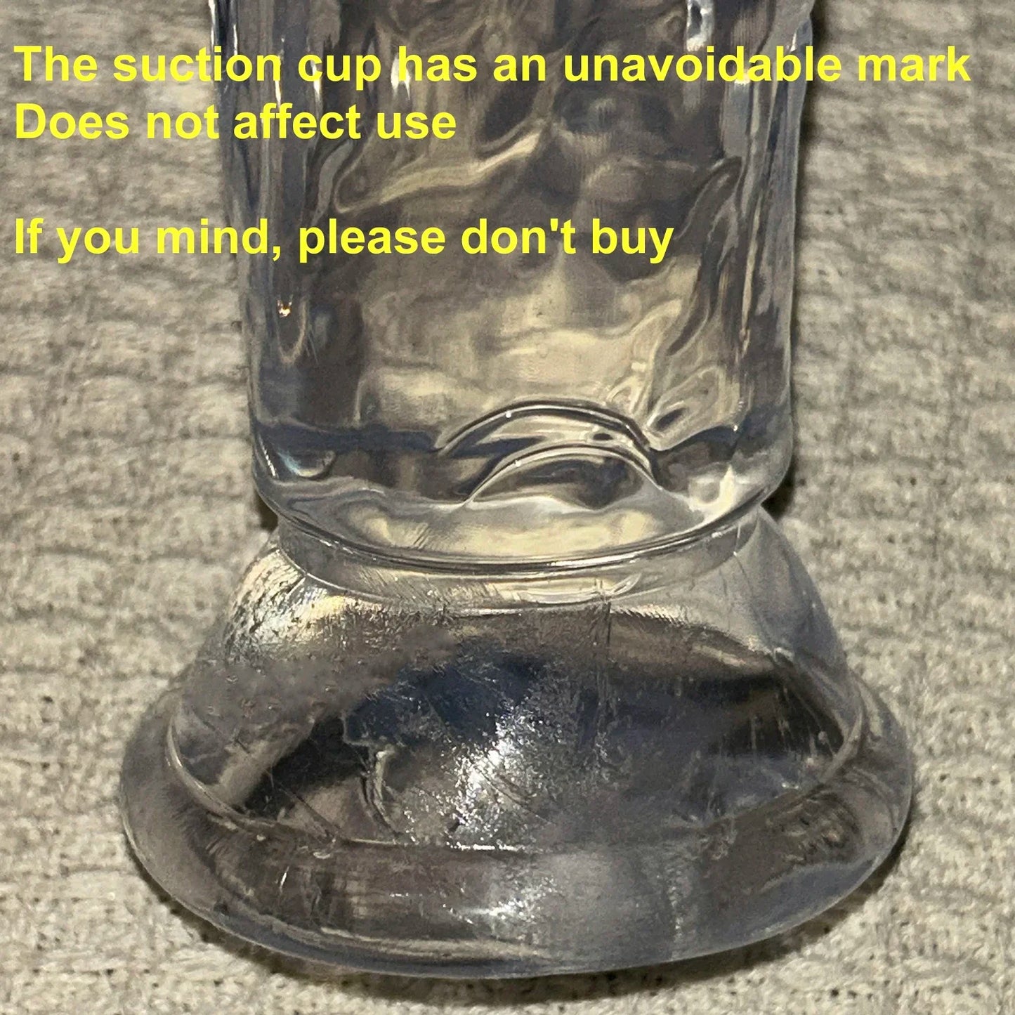 Transparent jelly dildo suction cup base close-up