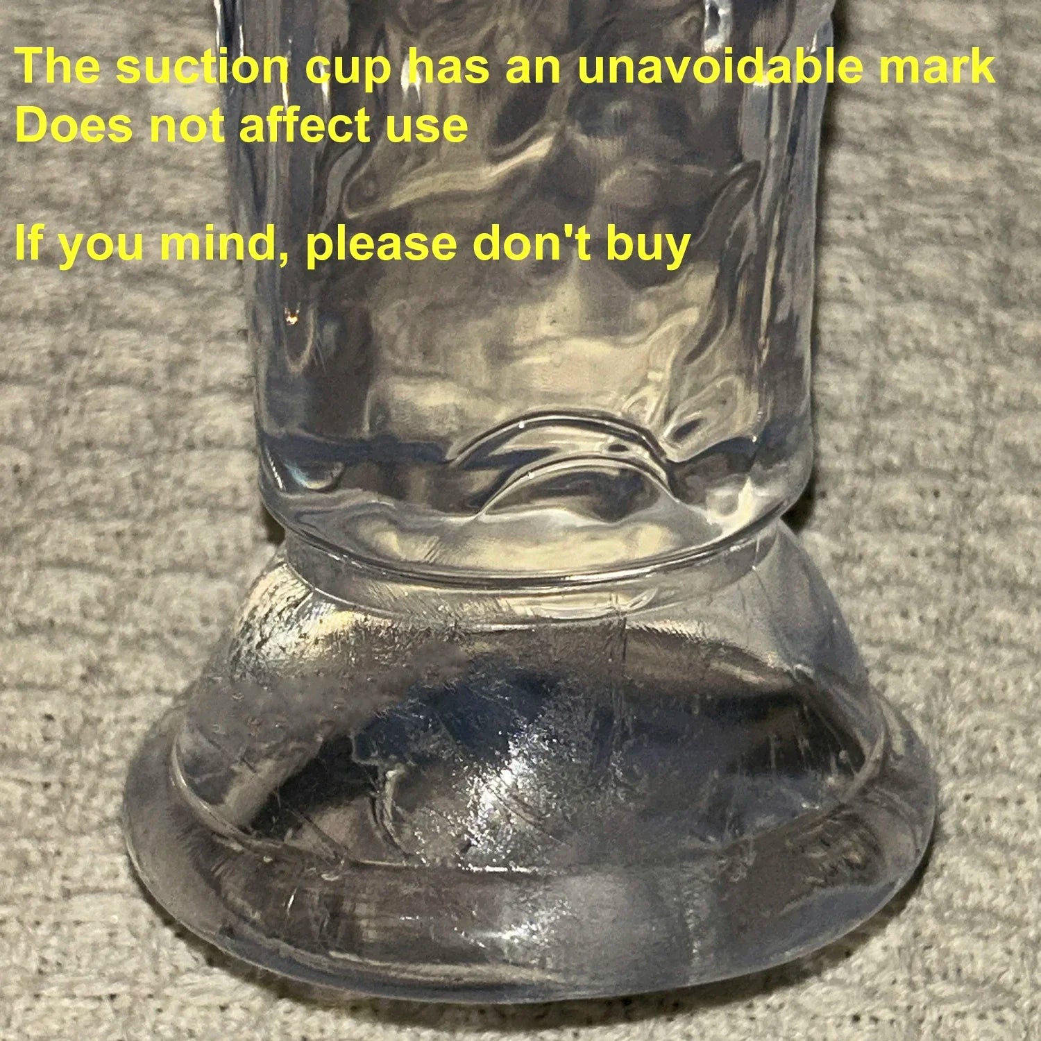 Transparent jelly dildo suction cup base close-up
