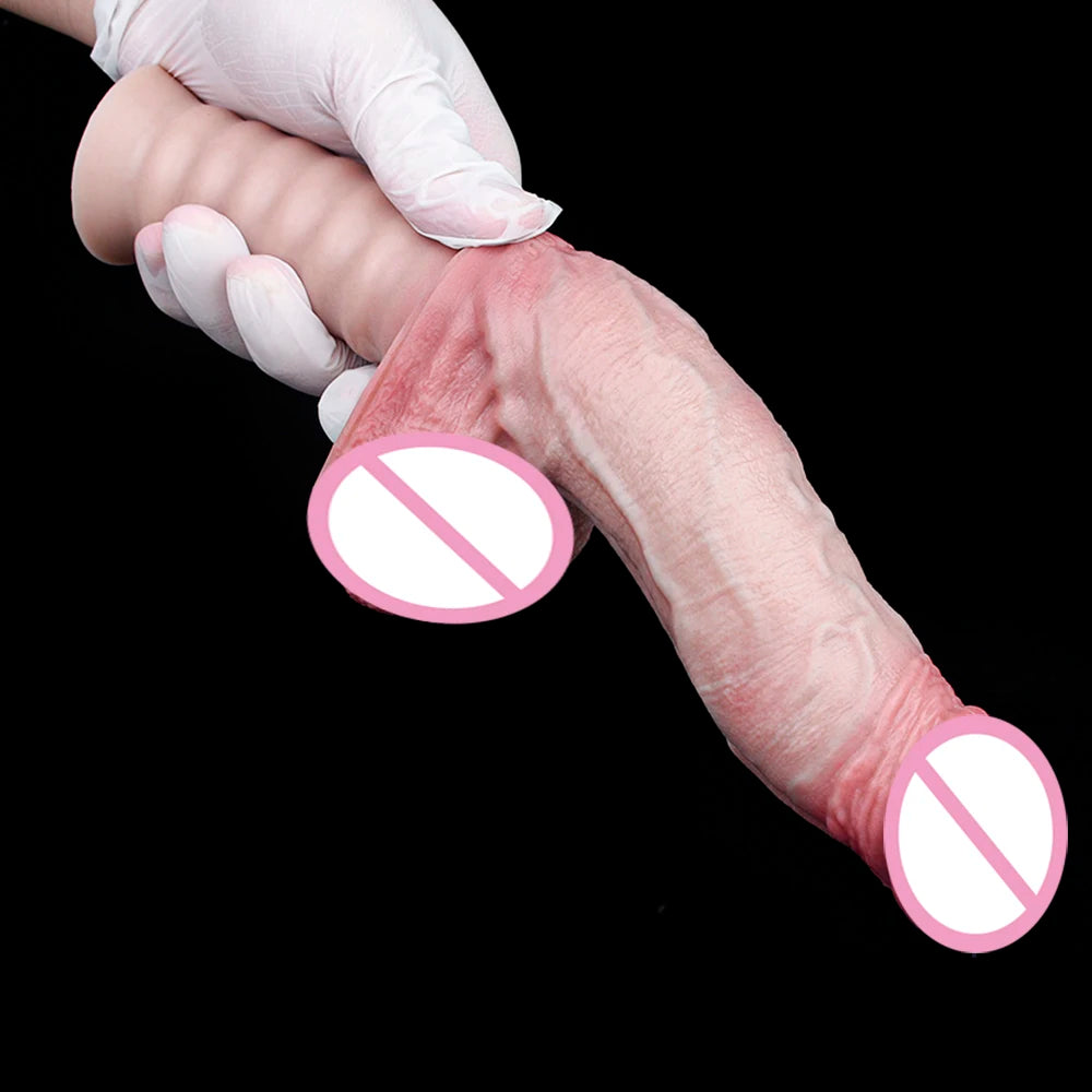 Light pink silicone dildo with textured surface and suction base, angled close-up