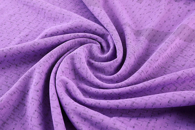 Purple textured mesh fabric, folded close-up