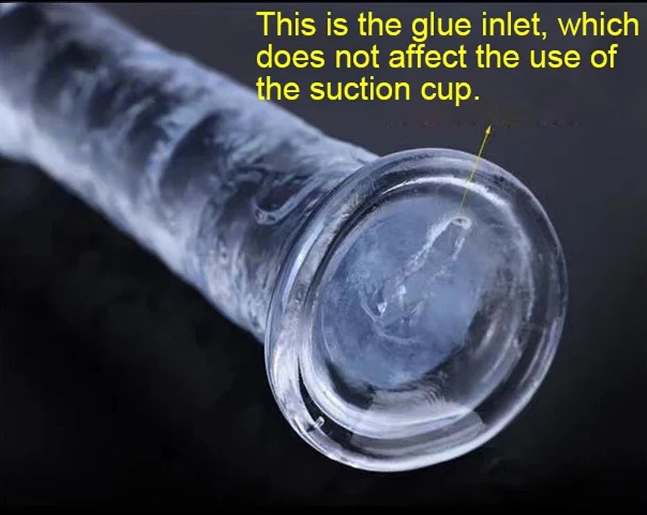 Realistic jelly dildo with suction cup, close-up of the suction cup base end