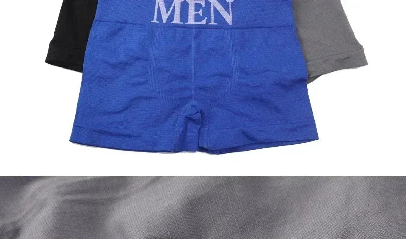 Blue cotton boxer briefs with “MEN” waistband print and stitched front seam