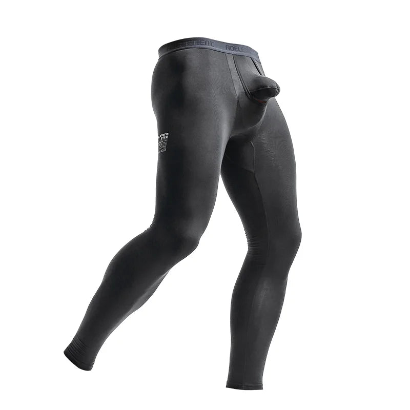 Dark gray thermal base layer pants, close-fitting stretch fabric and waistband