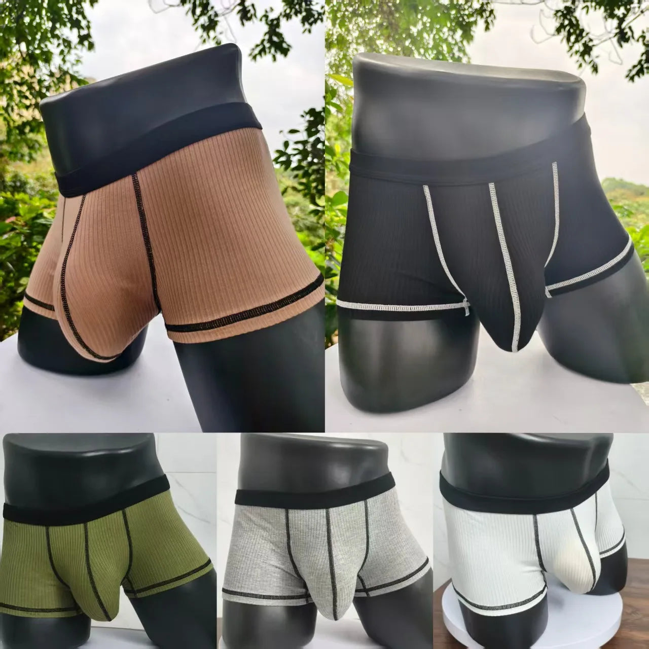 Multi-color boxer shorts set on mannequins: black, gray, white, and tan options.