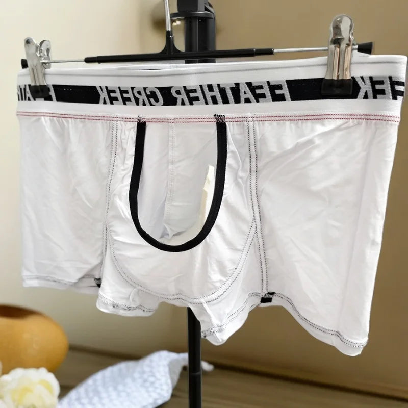White sports boxer shorts with black pouch panel and wide logo elastic waistband