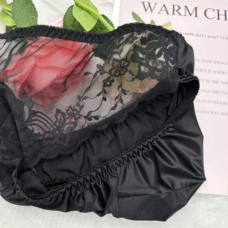Black jacquard lace U-pouch brief, close-up of ruffled waistband and lace overlay