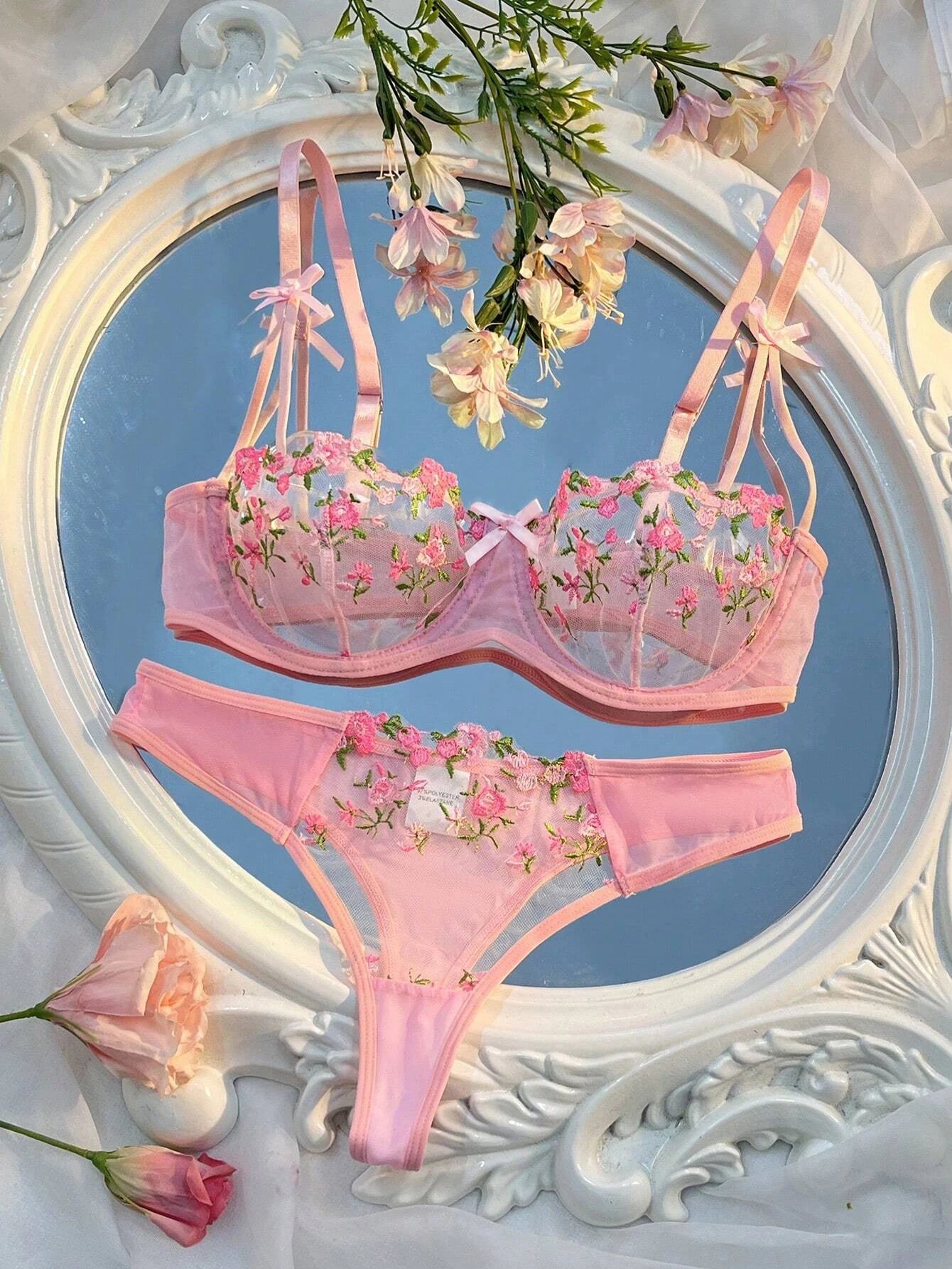 Pink floral embroidered sheer lace bra and thong set with bow strap details