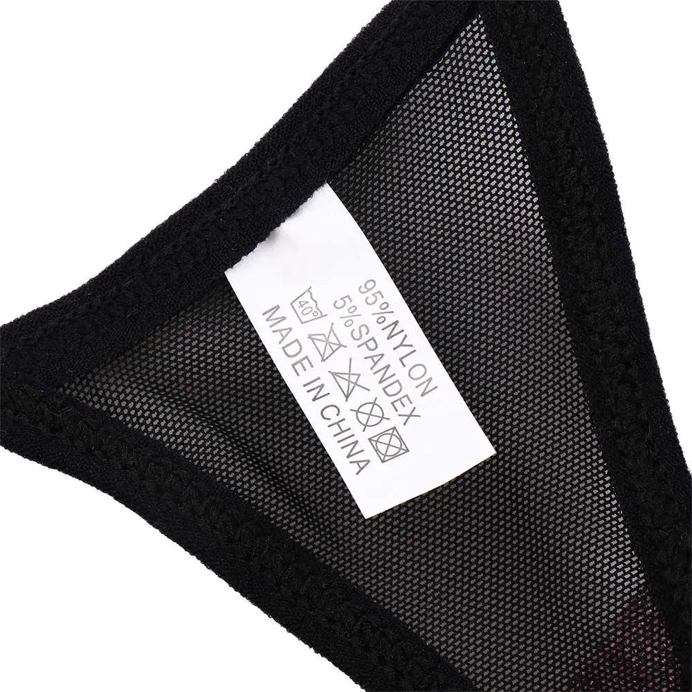 Black mesh and lace panty brief with brand tag at inner panel