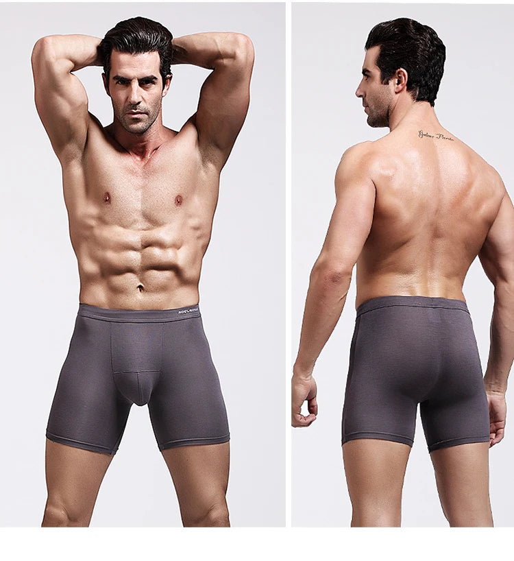 Gray compression boxer briefs on model, front and back views