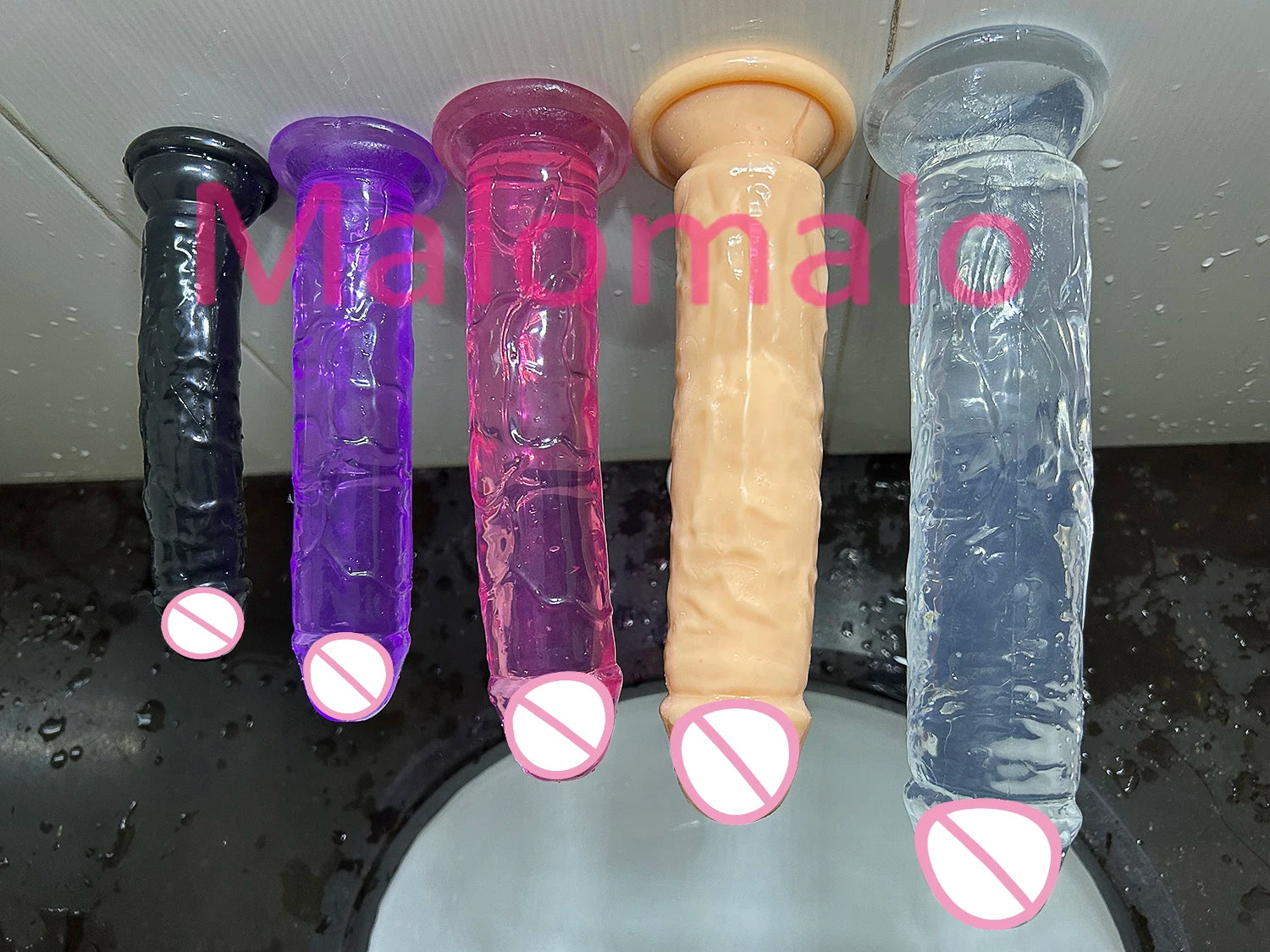 Assorted transparent jelly dildos with suction cups: black, purple, pink, flesh, clear
