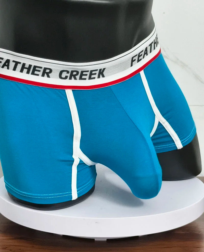 Blue sports boxer shorts with white contrast seams and elastic waistband trim