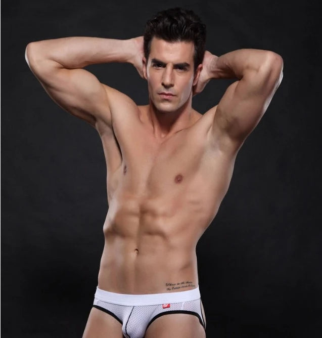 Low-rise hip-lift thong on model, white with black trim and red logo, 1pc