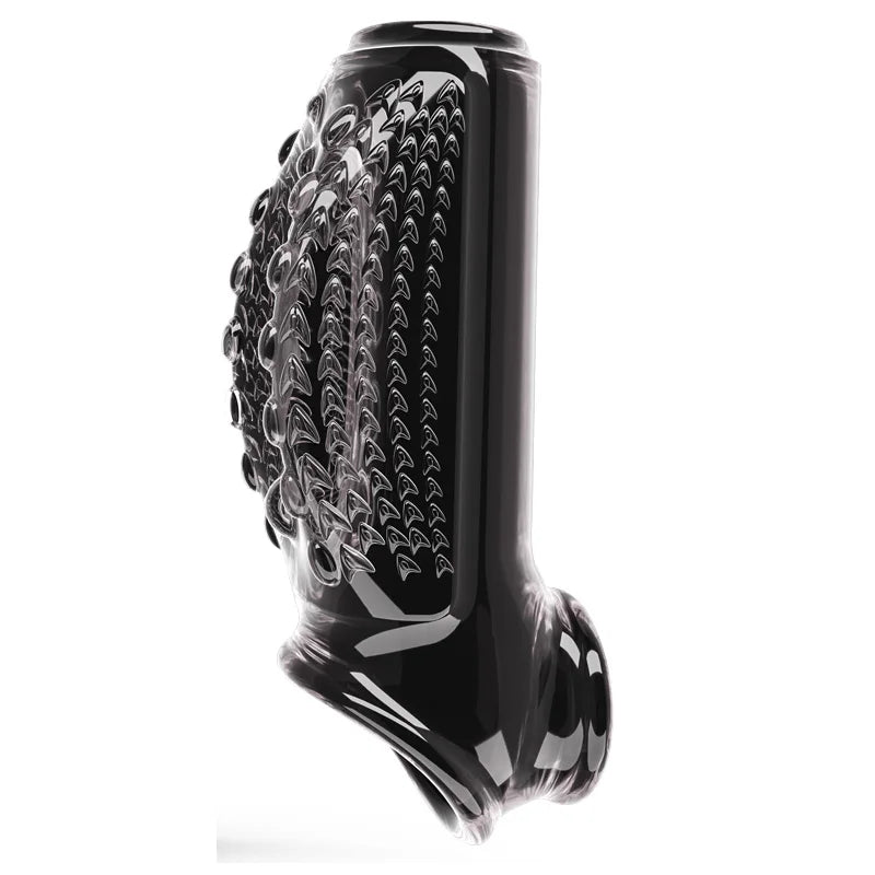 Black delay cock ring, close view of textured ridges and circular grip bumps on the band